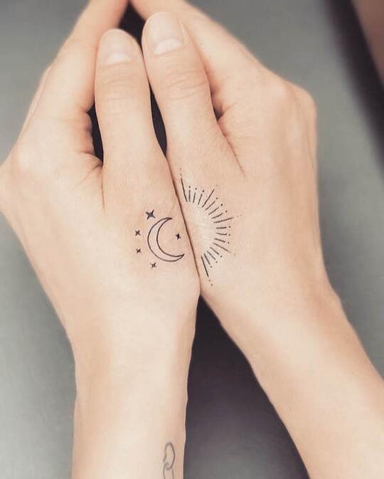 Sun and Moon hand tattoo