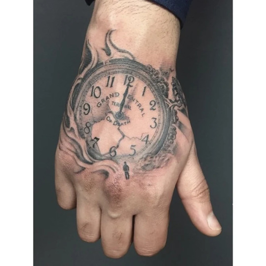 clock hand tattoo for men