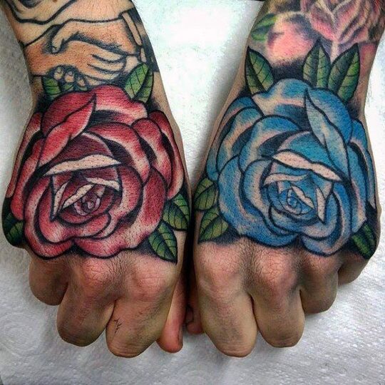 traditional rose hand tattoo