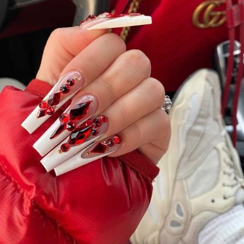 French nails with red gems