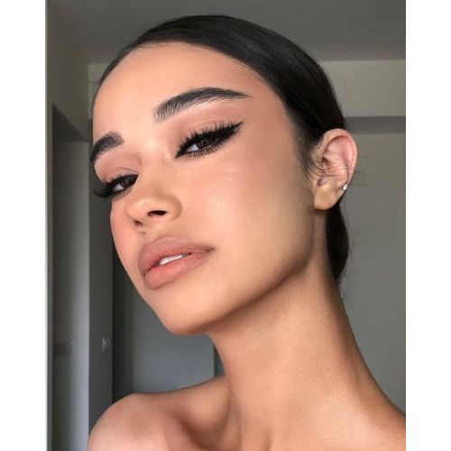 Bold Eyeliner and nude lips